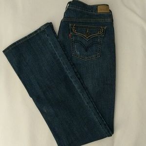Levi jeans with embroidered/stud/distressed pocket